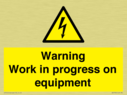 warning-work-in-progress-on-equipmentwith-electrical-hazard-symbol~
